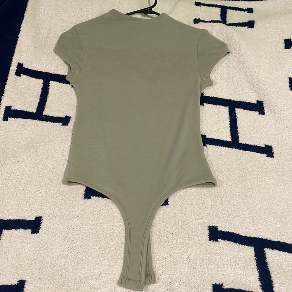 NWT brand new sage green body suit!